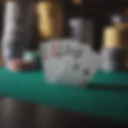 Chips stacked on a blackjack table with cards